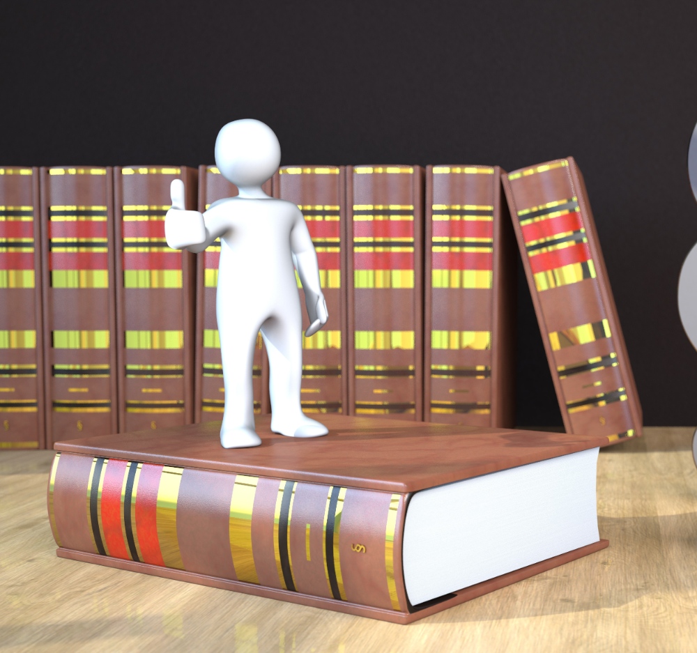 Weißes Männchen auf Buch und vor Büchern