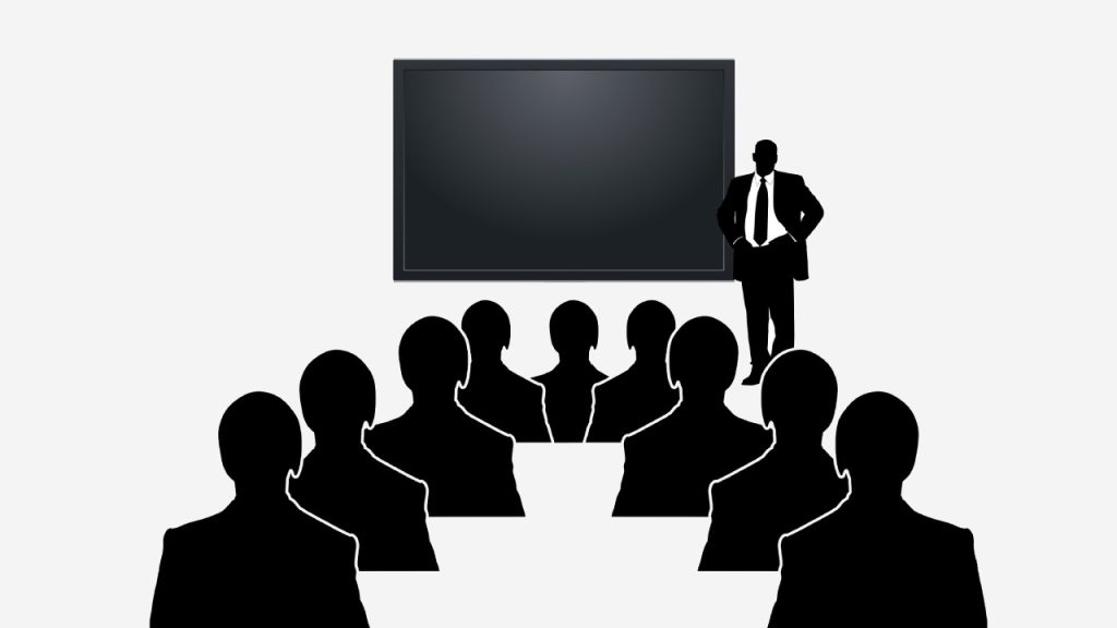 Zeichnung von Personen vor schwarzem Bildschirm